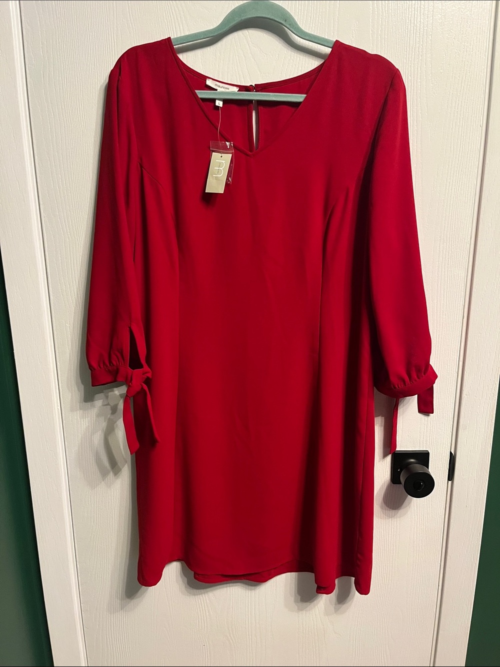 NWT Maurice’s red Midi dress in a size large. It has 3/4 length sleeves!